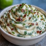 Homemade chipotle lime mayonnaise in a bowl, infused with zesty lime and spicy adobo for a bold, tangy flavor.