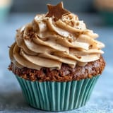 Fluffy vanilla Taurus Birthday Cupcakes artfully frosted with warm, inviting terracotta-colored buttercream frosting.