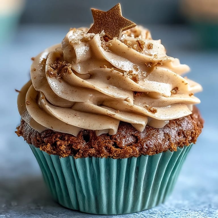 Fluffy vanilla Taurus Birthday Cupcakes artfully frosted with warm, inviting terracotta-colored buttercream frosting.